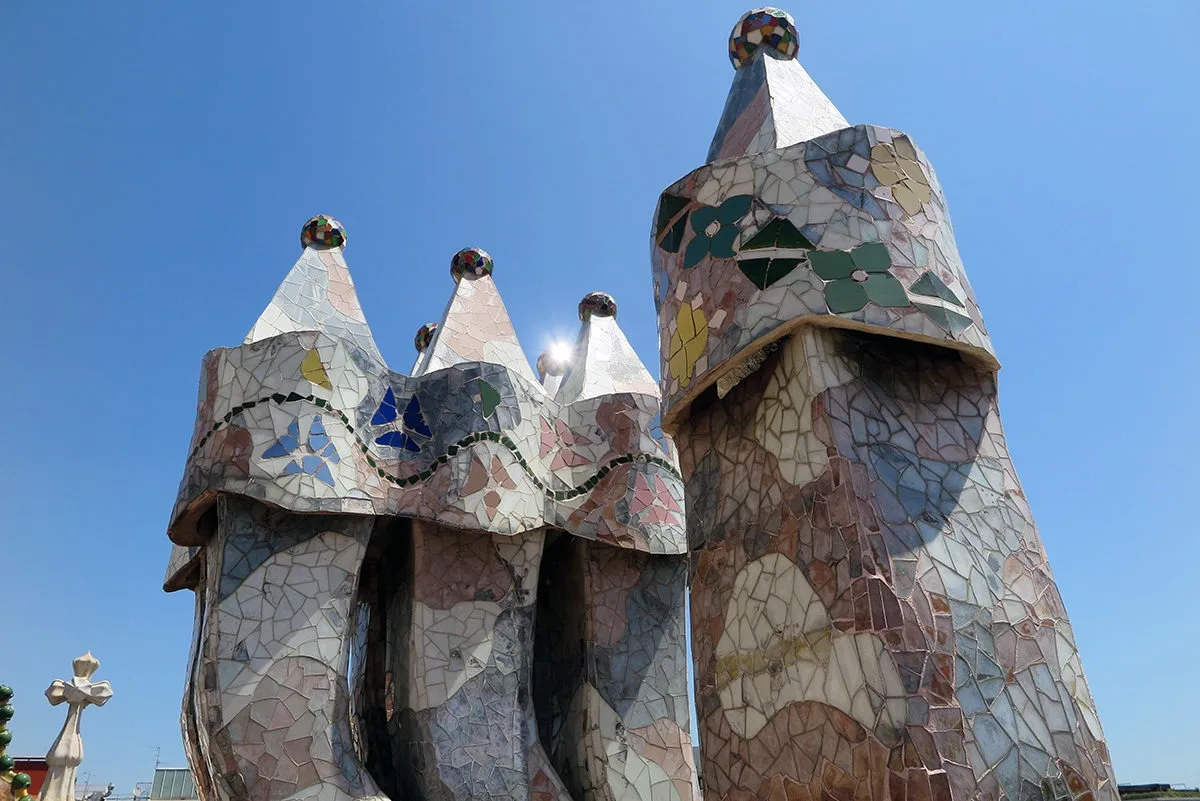 Chimneys of Casa Batllo covered with trencadís, broken tiles.