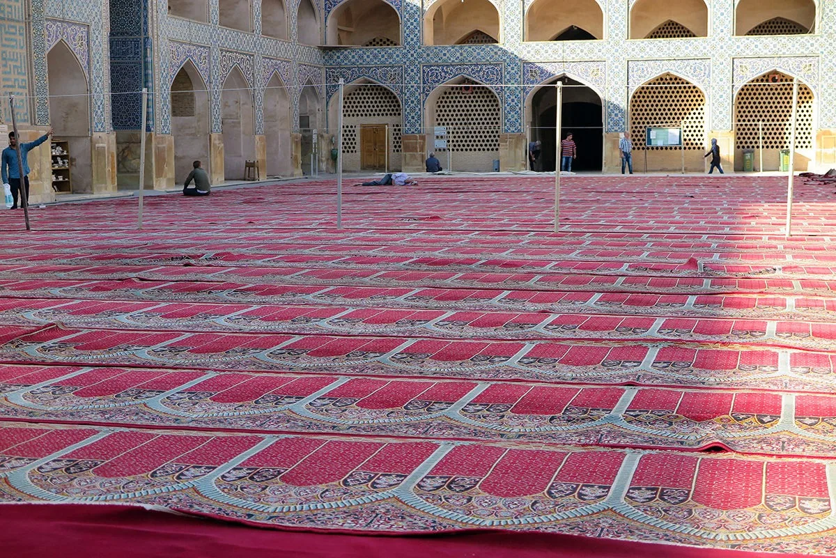 Getting ready for a prayer in a mosque in Esfahan, Iran