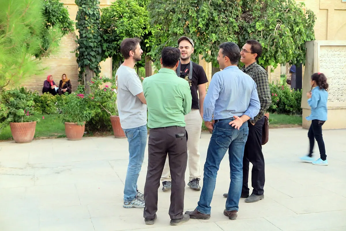 Chatting with locals at Hafez' mausoleum, Shiraz, Iran
