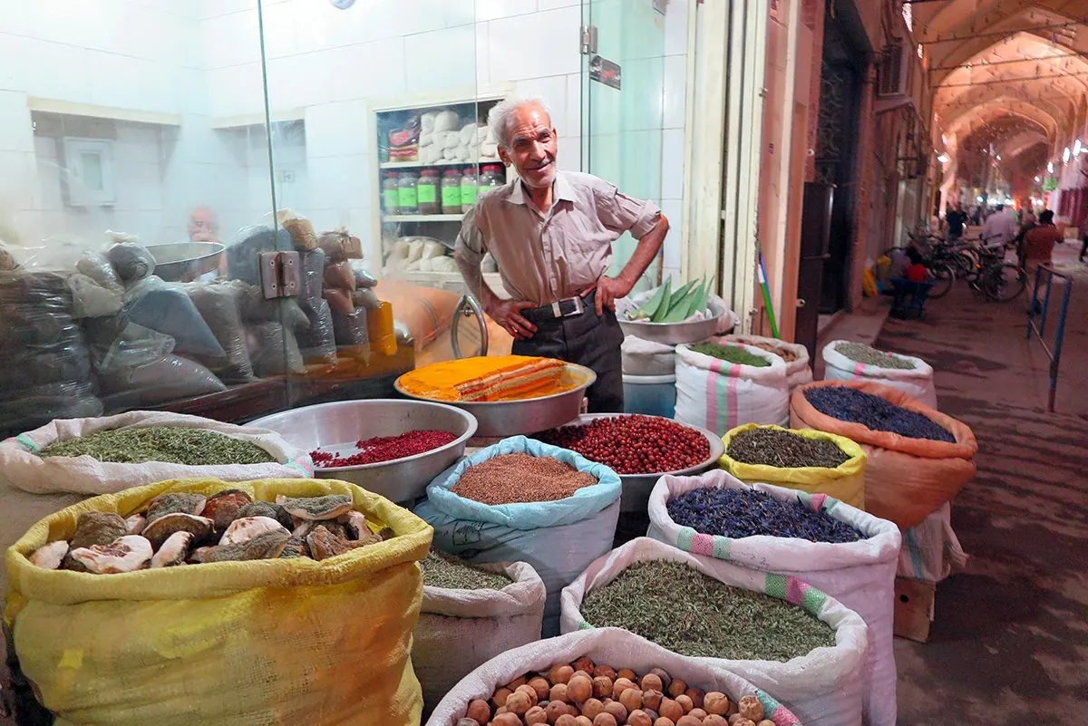 Spice shop owner, bazaar in Esfahan, Iran