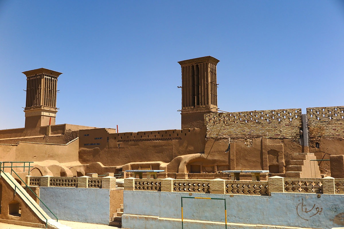 Charming Yazd - that's badgir chimneys and mud structures.
