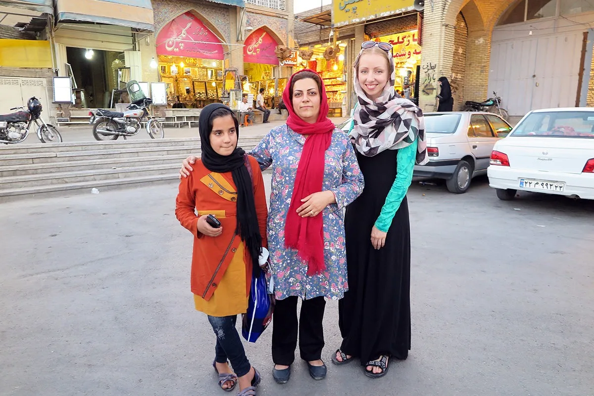 With a local woman and her daughter in Esfahan, Iran