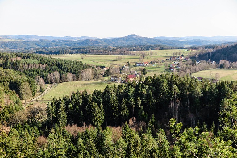 Beautiful views from Šaunštejn: a village of Vysoká Lípa, with forests and fields all around.