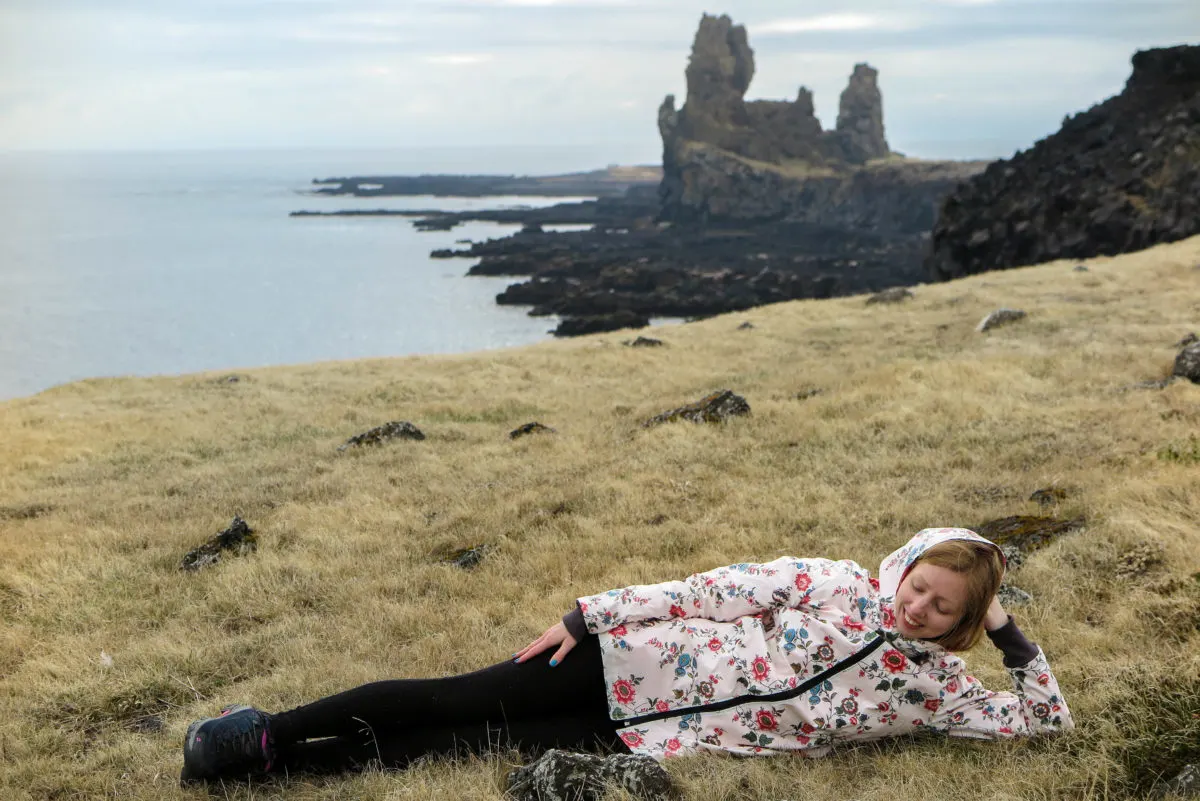 I couldn't resist lying down on the soft yellow grass.. with Lóndrangar cliffs behind