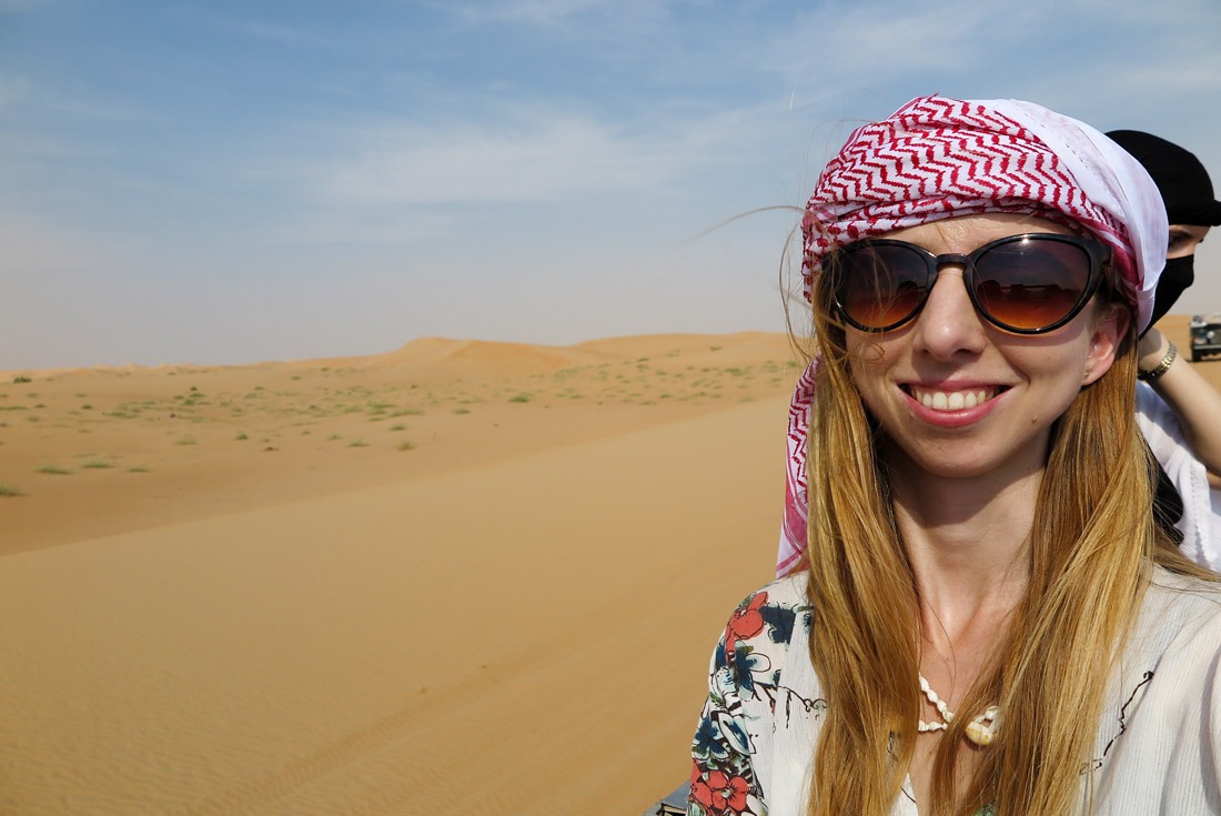 Veronika wearing a shemagh in the Dubai desert