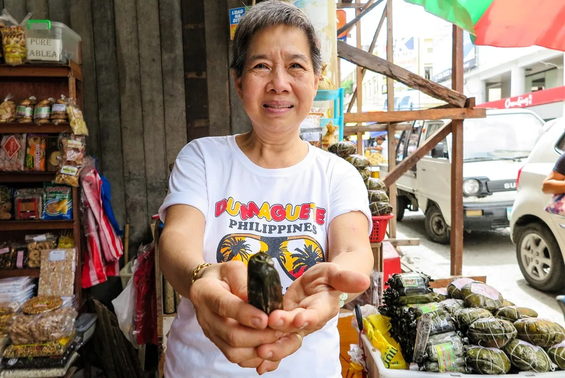 Mrs. Cherry and her homemade Kakanin sweets, Tacloban street market
