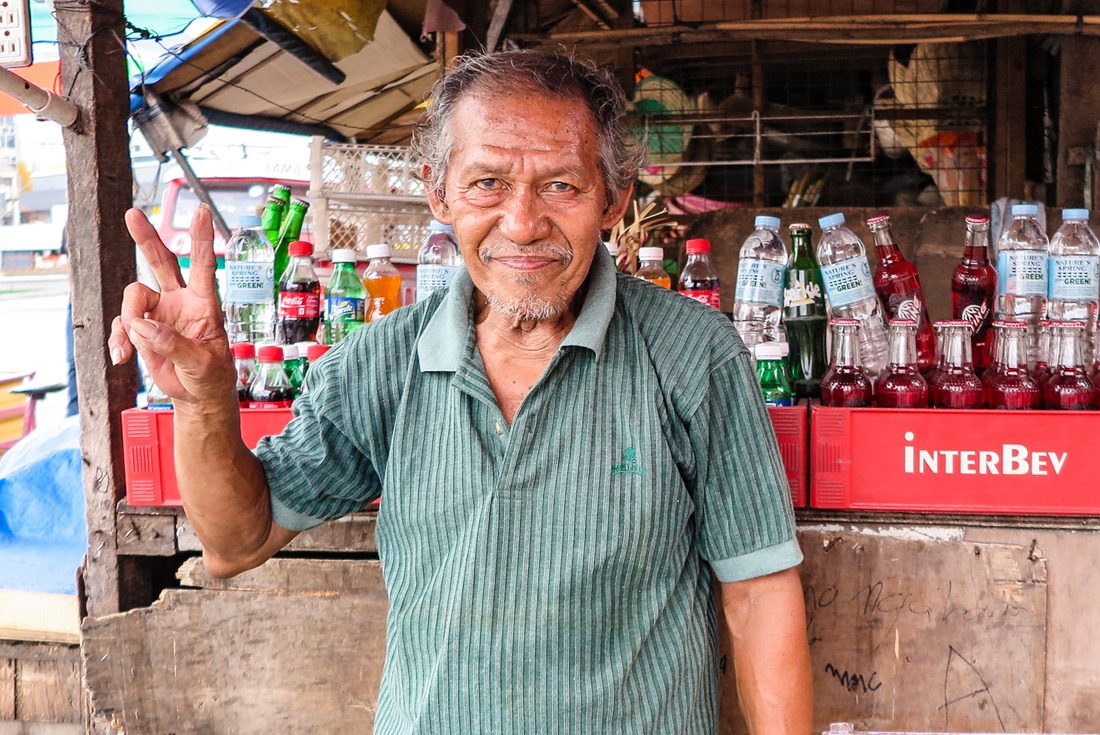 A friendly man posing at the Tacloban street market, Leyte