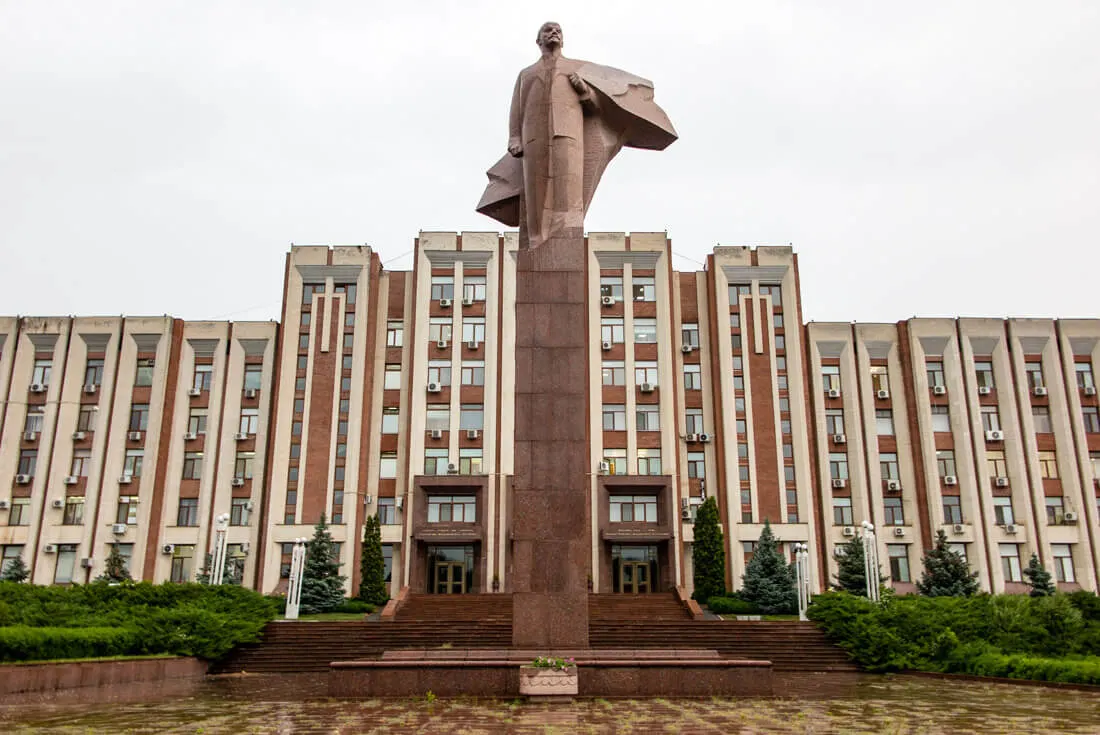 Another government building with Lenin statue in front