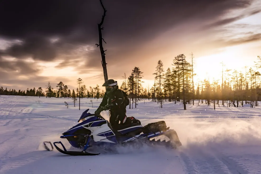 Things to do in Lapland, Finland: Riding a snowmobile can't be missed!