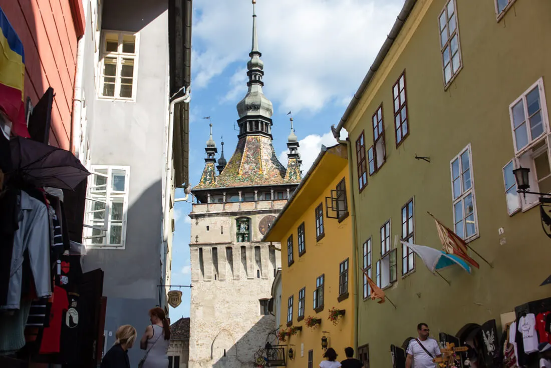 Clock Tower in Sighisoara peeking from behind the Dracula House