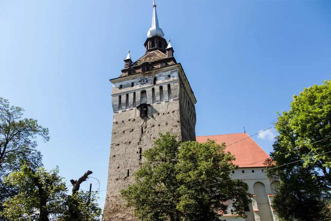 Saschiz Tower - a sister of Sighisoara's Clock Tower and the Saschiz Church hiding behind.