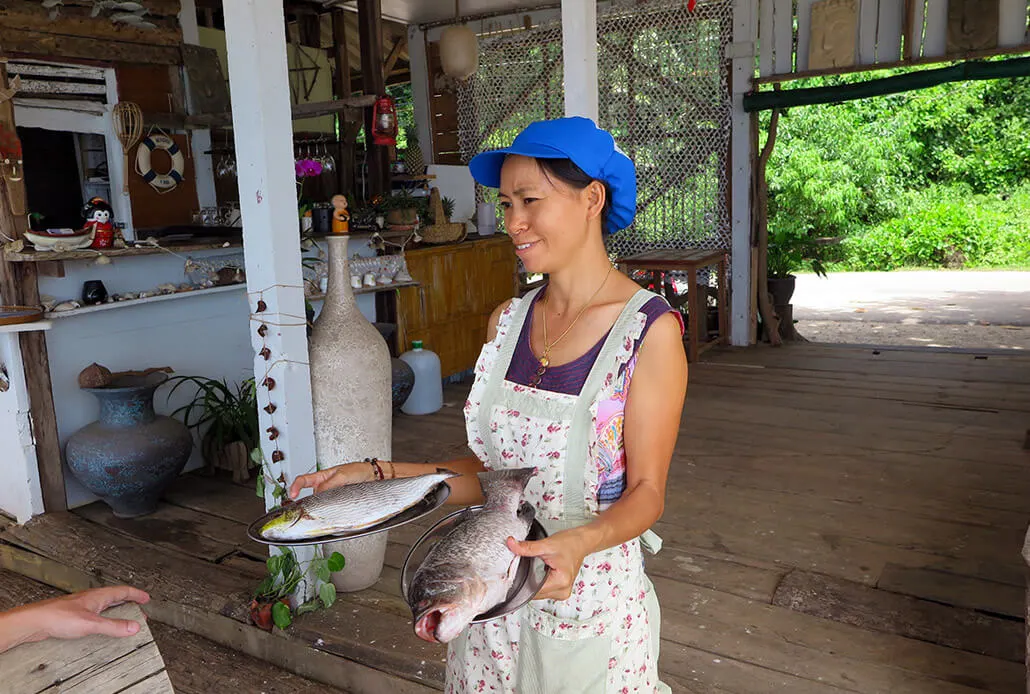 Lady at Shanti Shanti showing us what fish we could have - Koh Lanta, Thailand