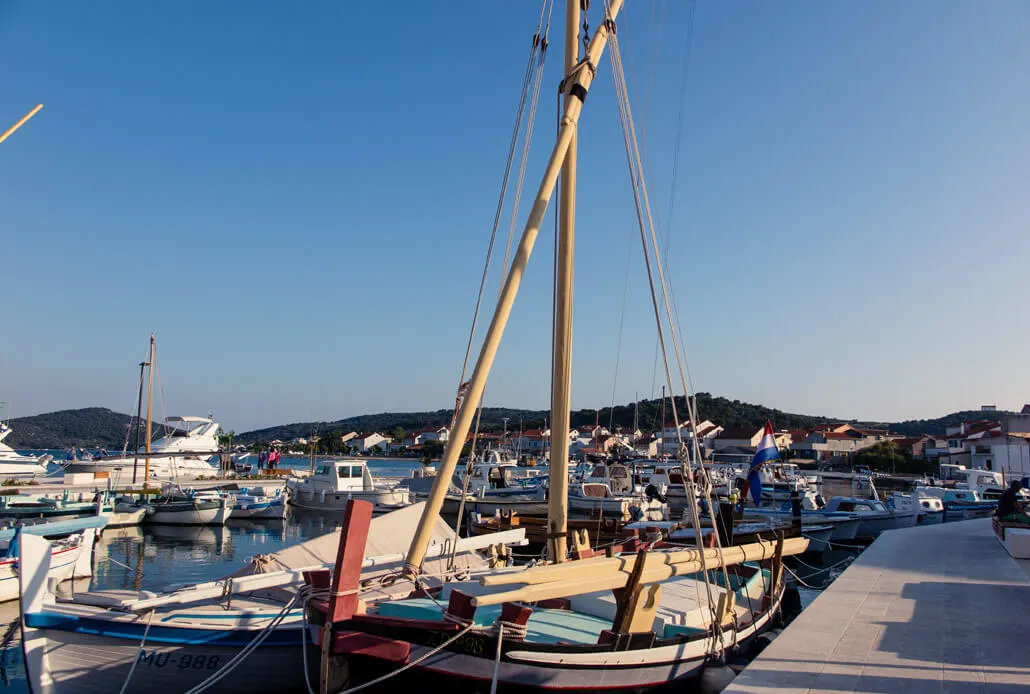 Wooden boats anchored in Betina port