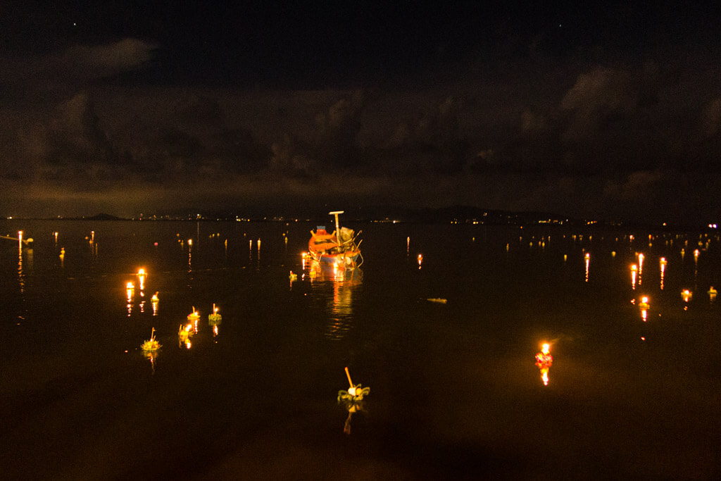 A bay full of candles on a Thai festival