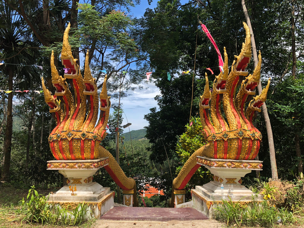 Serpentine-lined staircase at a Thai temple