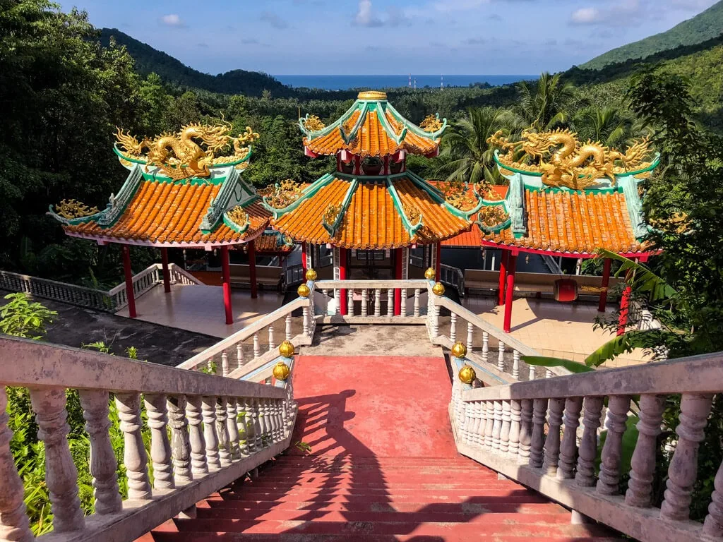 A temple and a view of the sea in Thailand