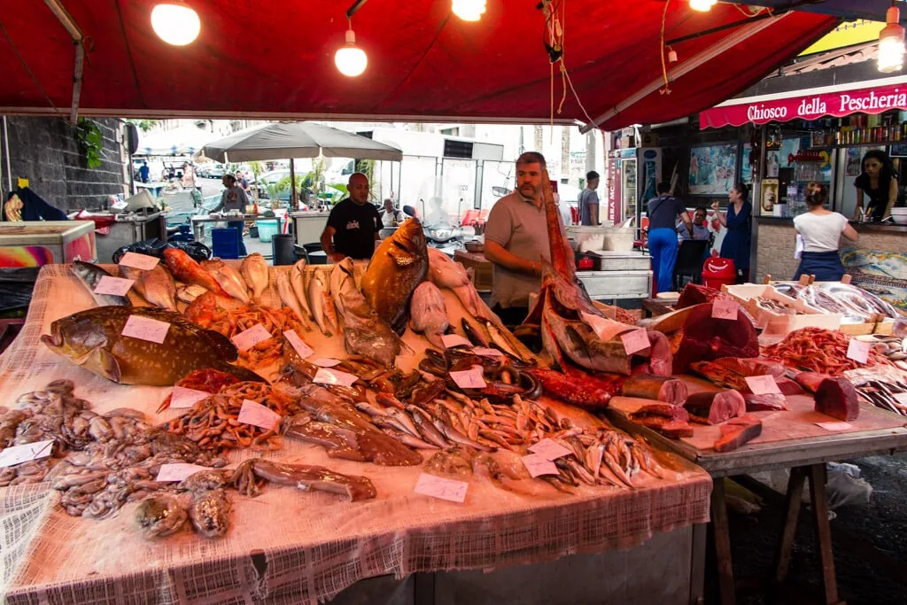 Fish market in Catania with fresh catch on display