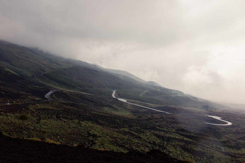 A road leading down Etna vulcano in Sicily