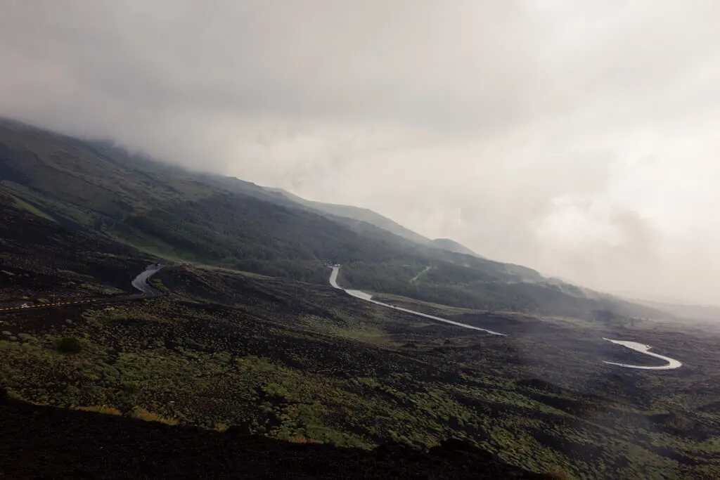 A road leading down Etna vulcano in Sicily