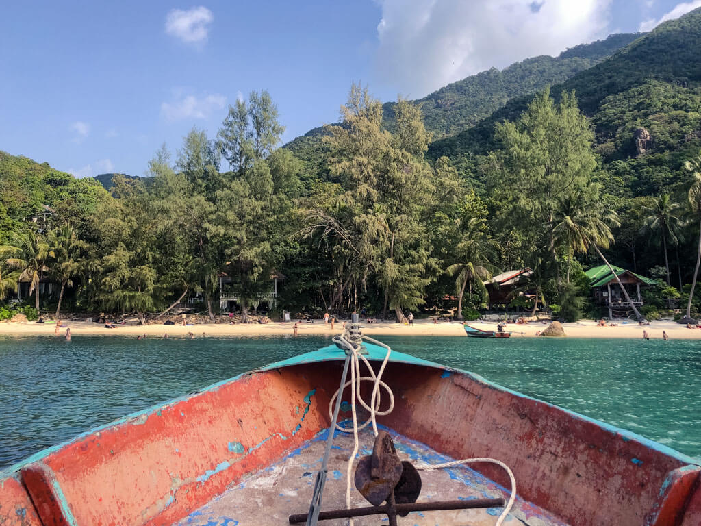 A boat approaching a beach