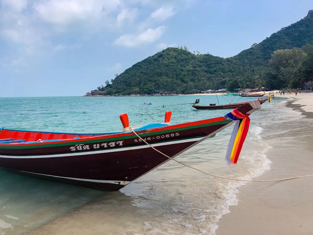 Thai longtail boats on a beach