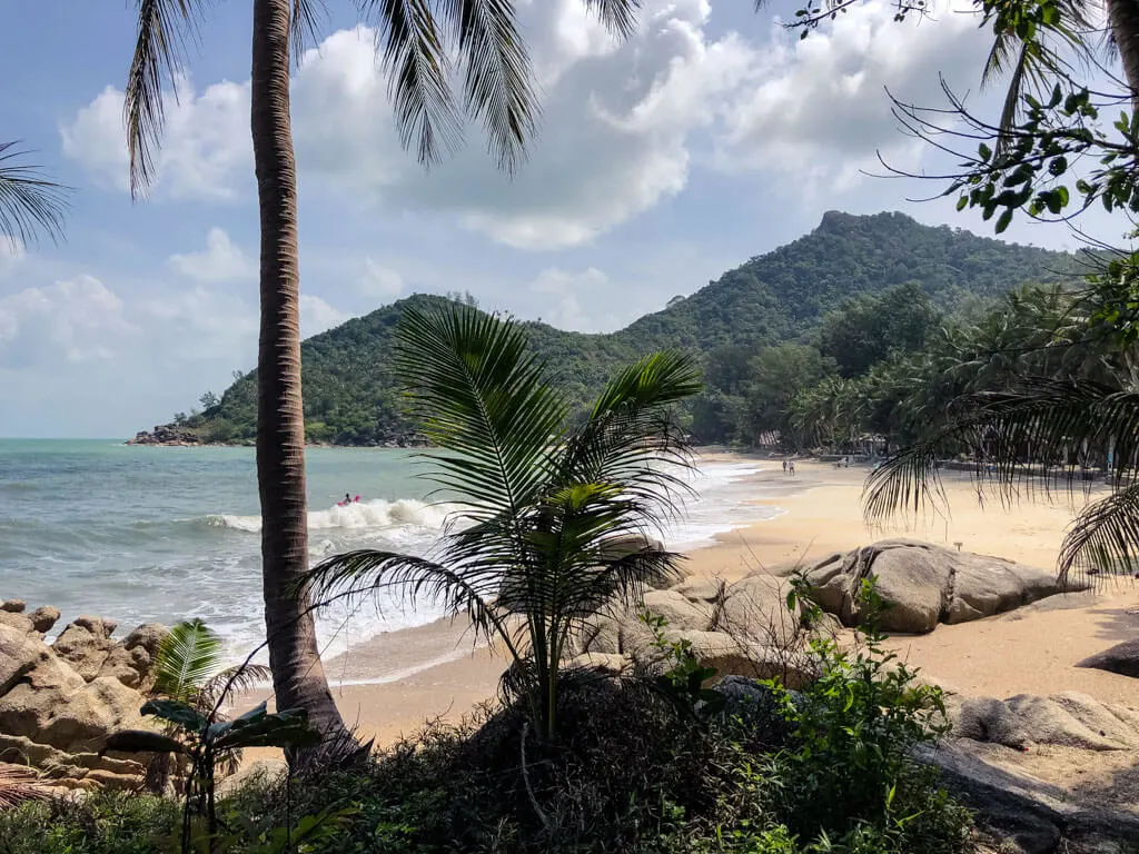 View of Bottle beach in Koh Phangan with hills in the background