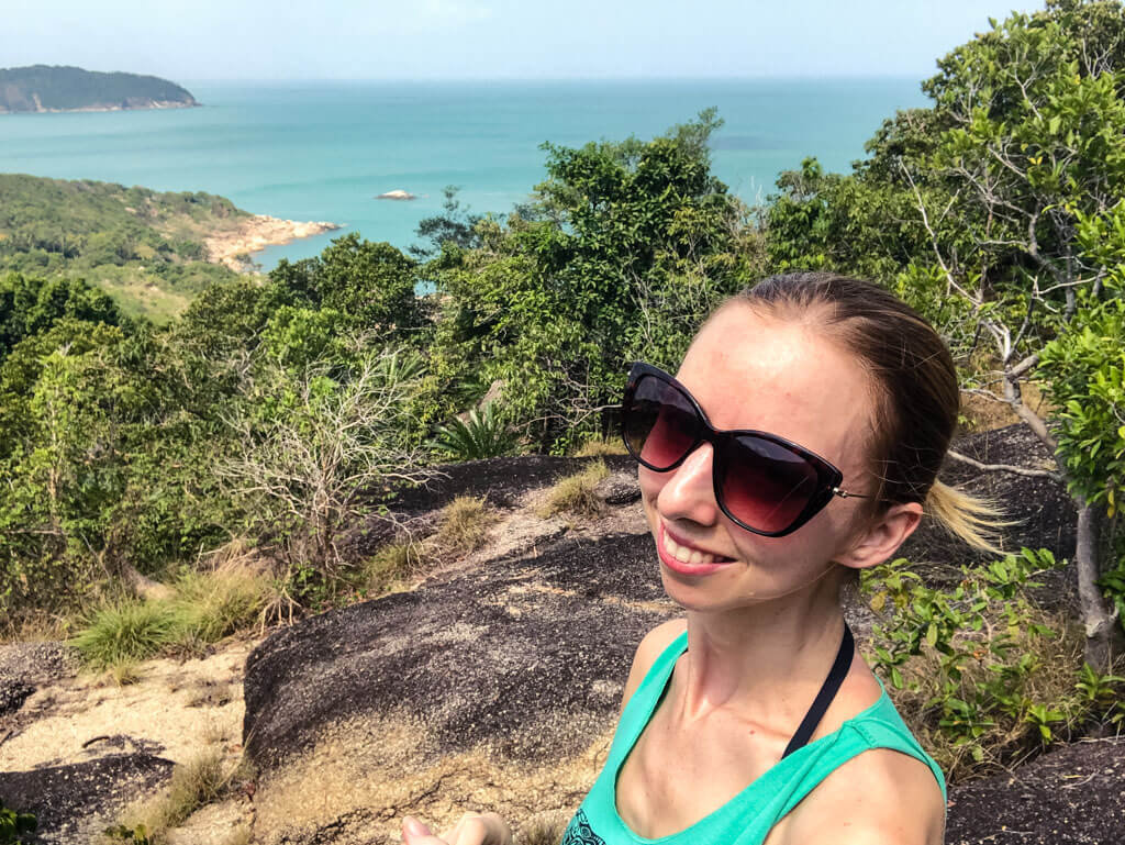 Selfie on a hike with the view of the ocean in the background