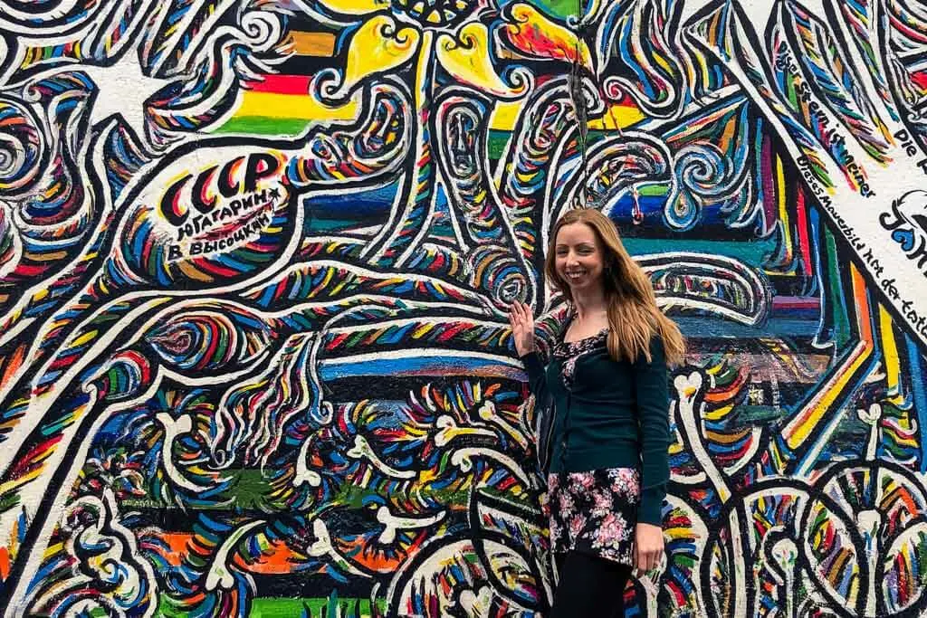 Veronika from TravelGeekery at the East Side Gallery in Berlin
