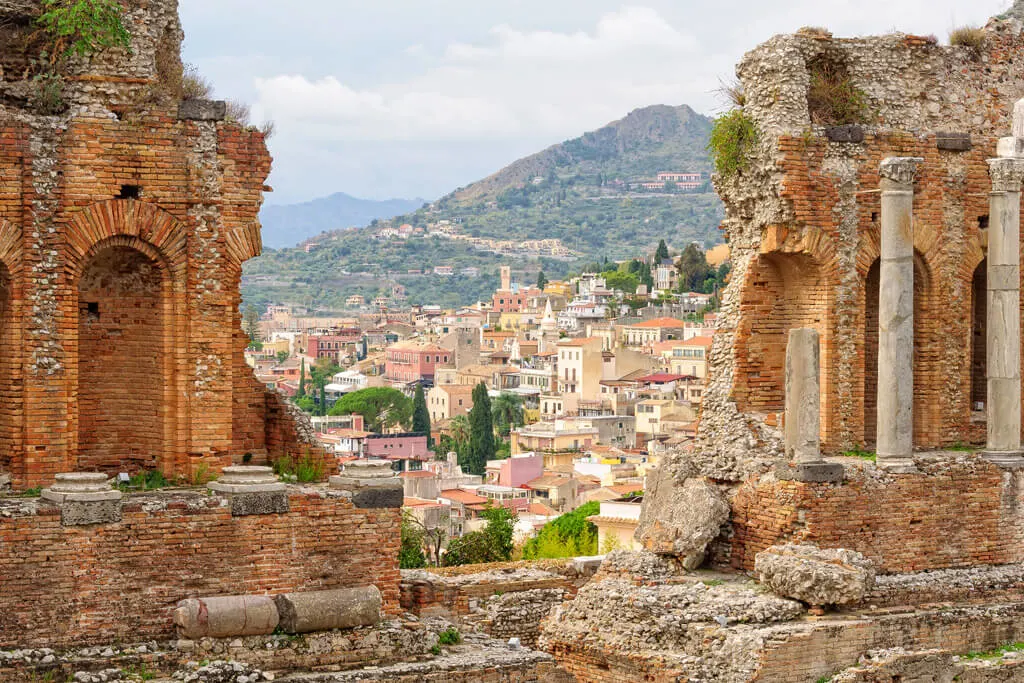 Taormina, Sicily - view of buildings through an amphitheatre