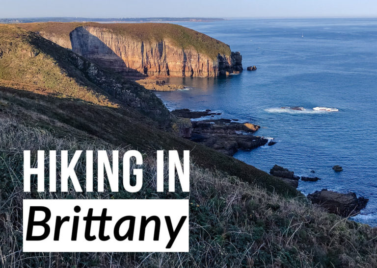Cliff views with text overlay: Hiking in Brittany