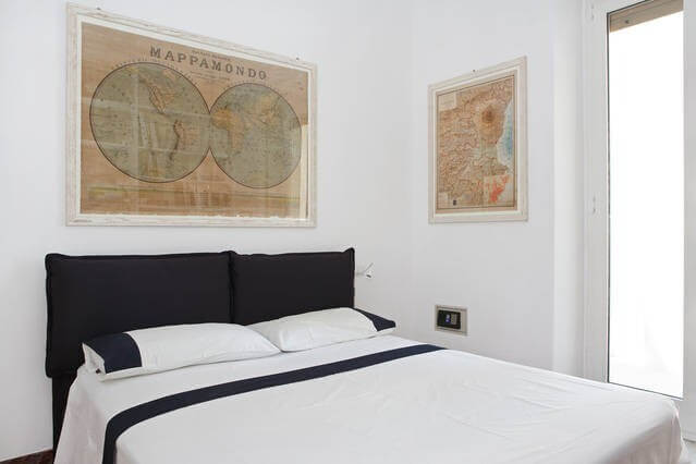 View of a bed in a private room on Airbnb Catania