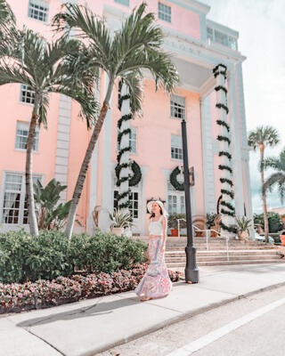 Posing in front of the Colony Hotel Palm Beach