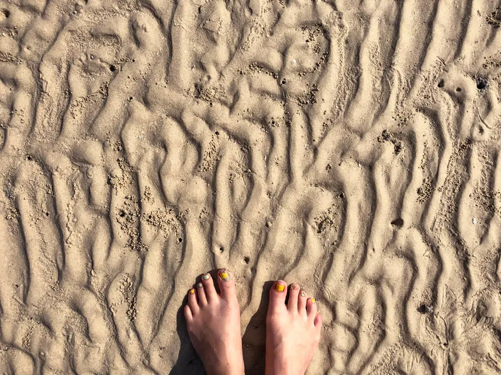 Feet in the sand