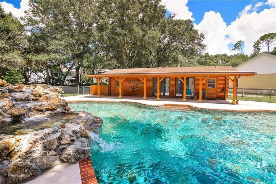 A small poolside cabin