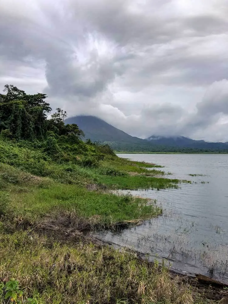 View of a volcano from the lakeshore