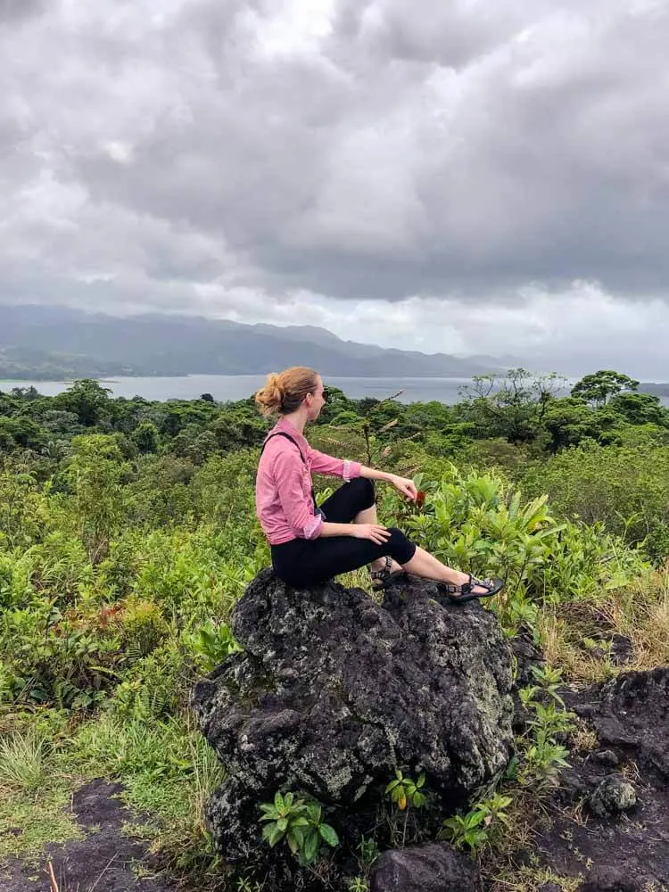 Veronika from Travel Geekery posing on a rock