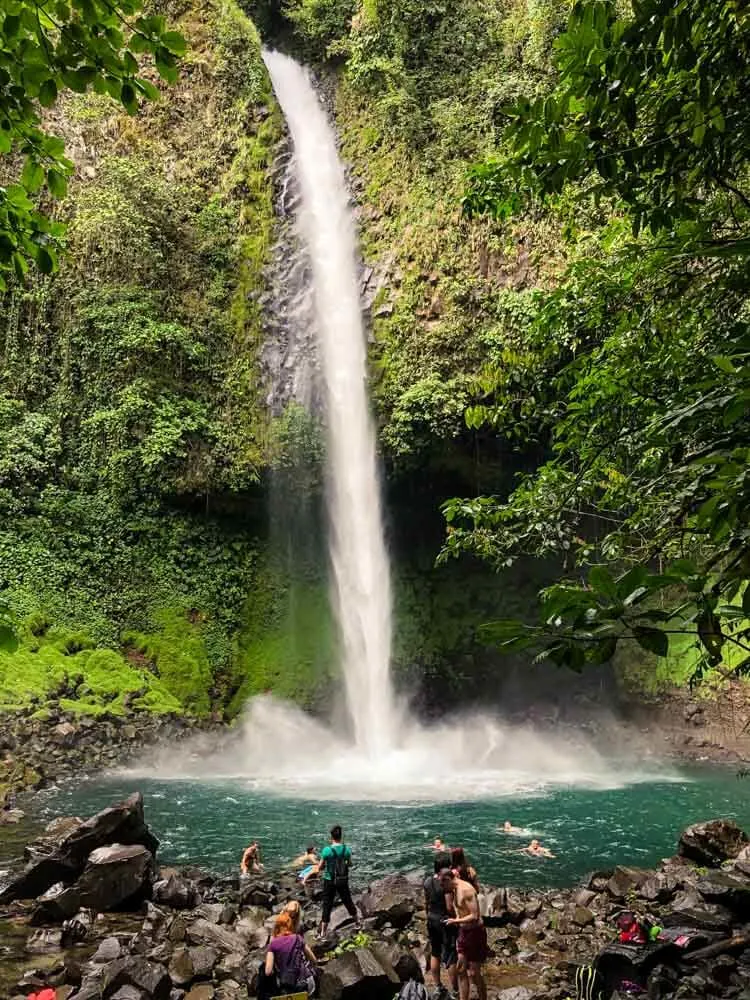 Waterfall falling into a natural pool