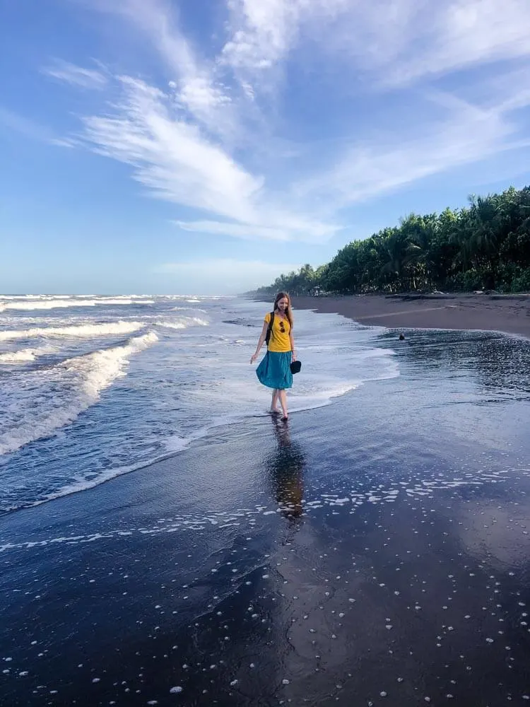 Veronika walking on a beach in Tortuguero Costa Rica