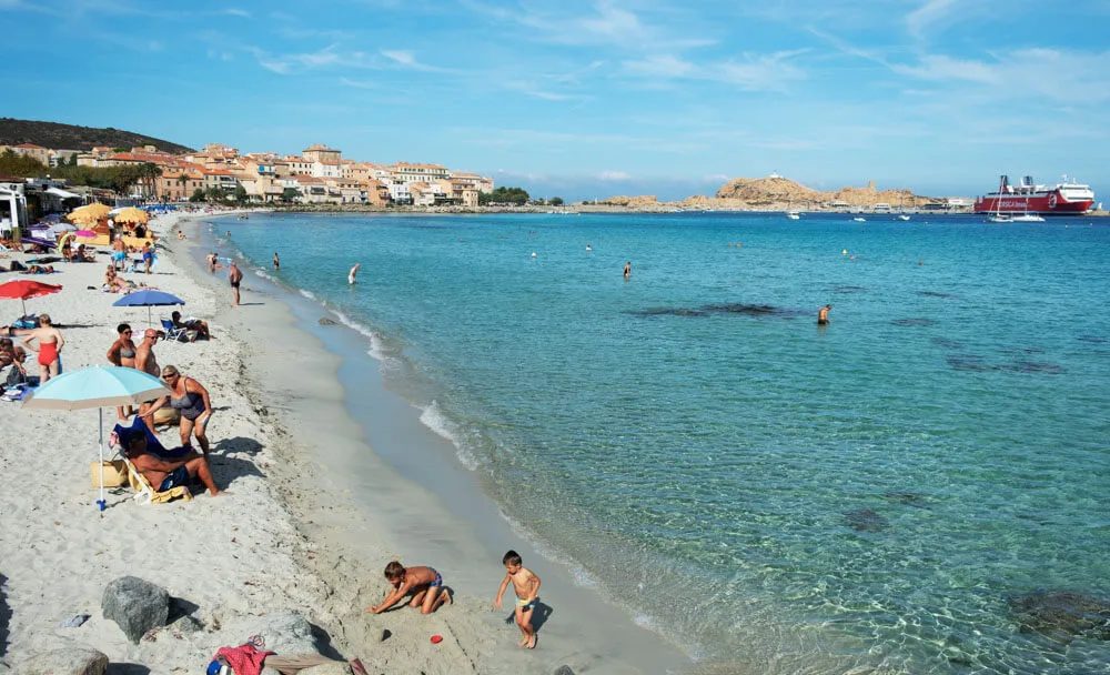 People on Ile-Rousse City Beach in Corsica