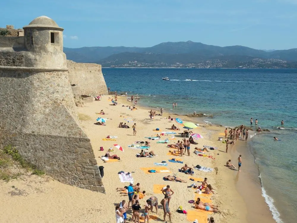 People enjoying beach in the city of Ajaccio in Corsica