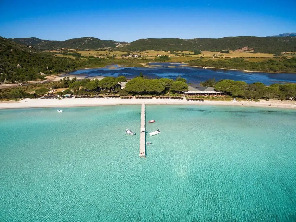 A white sand beach and a freshwater lagoon behind - Corsica, France