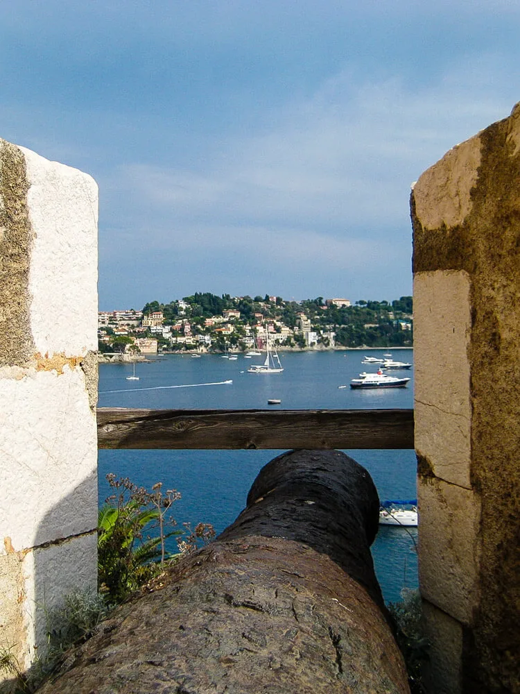 A cannon sticking out of a citadel
