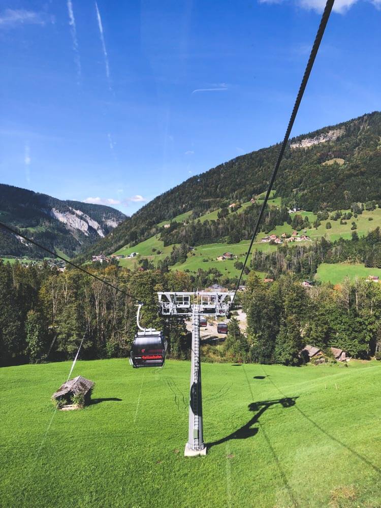 Riding a cable car in Austrian Alps