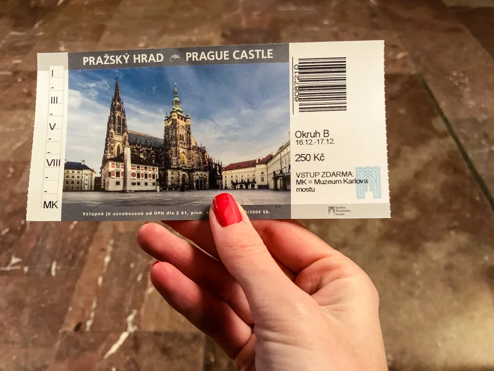 Prague Castle Ticket held in a hand