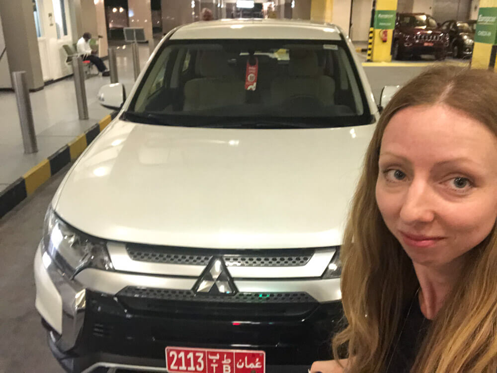 Veronika sad about returning her car rental in Oman