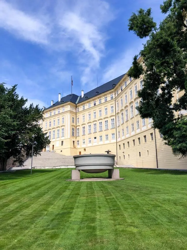 A granite bowl on a lawn in a Prague Castle Garden