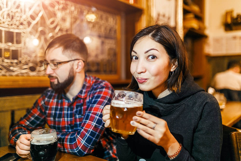 A couple enjoying beer in Prague