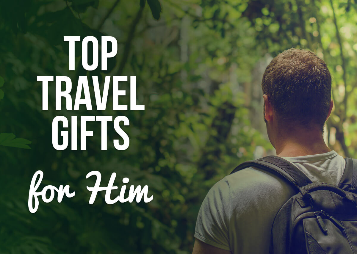 A man in greenery with a text overlay: Top Travel Gifts for Him