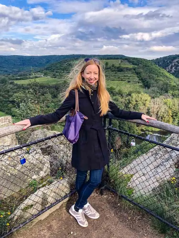 Veronika of Travel Geekery posing at Nine Mills viewpoint in Podyji NP in the Czech Republic