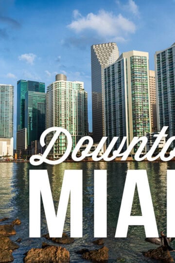 View of skyscrapers with a text overlay: Downtown Miami